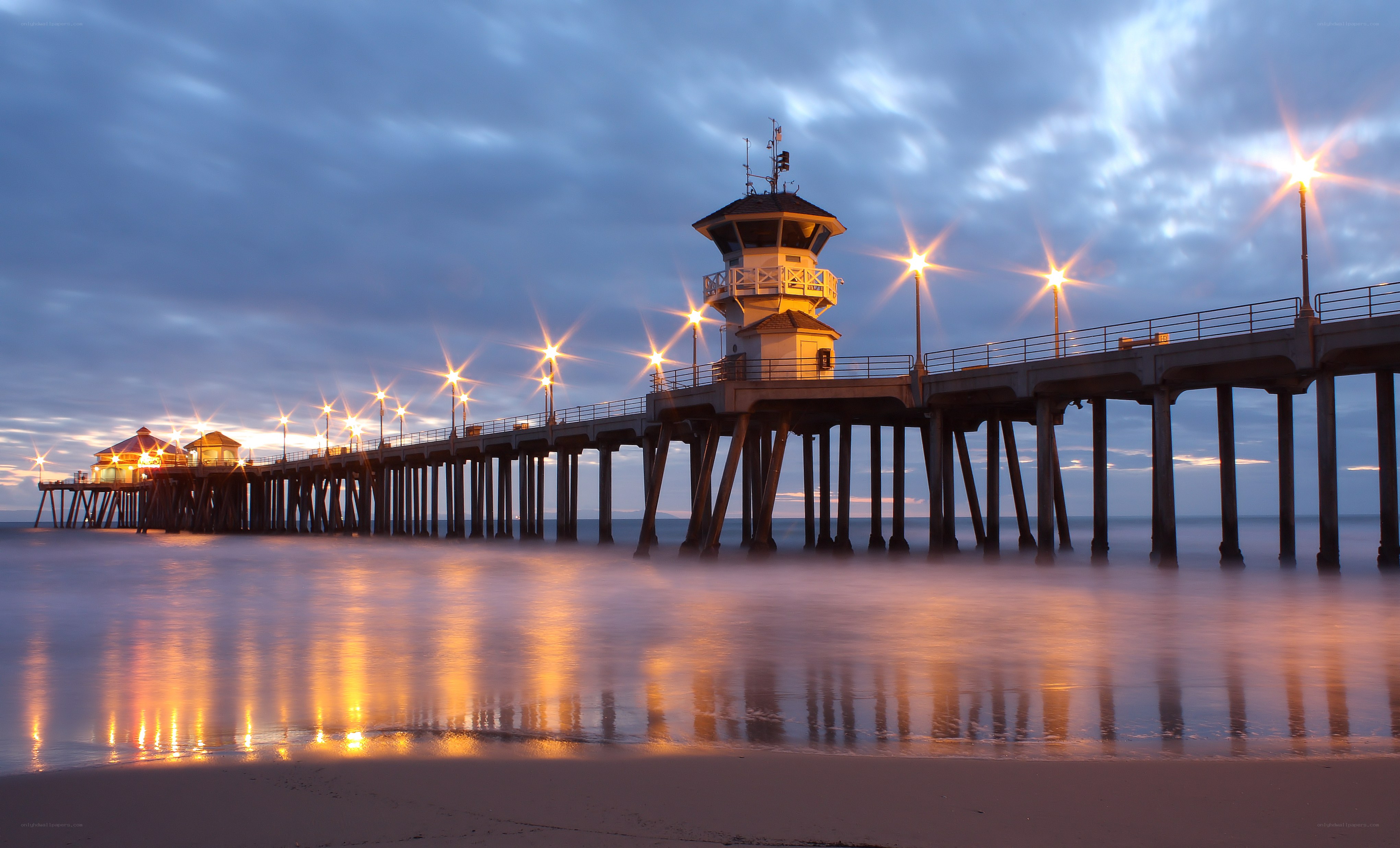 Pier at dusk with lights