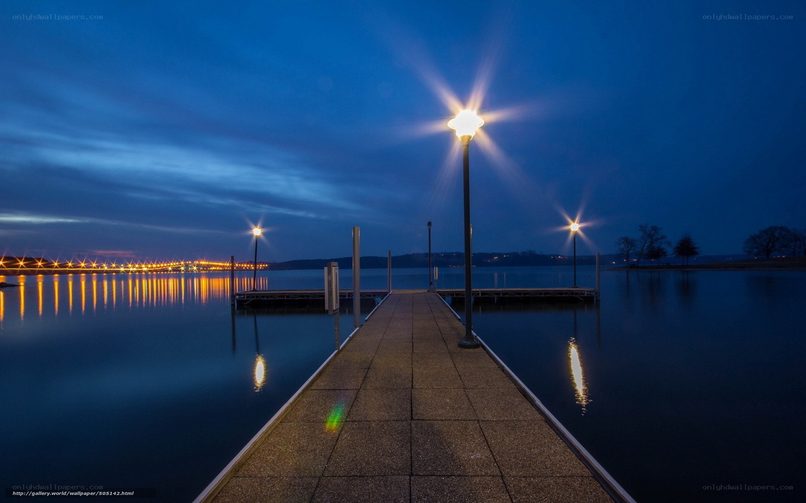 Pier at dusk with lights