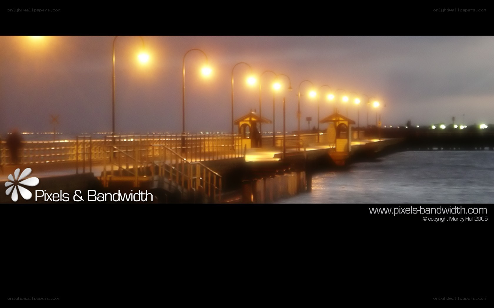 Pier at dusk with lights
