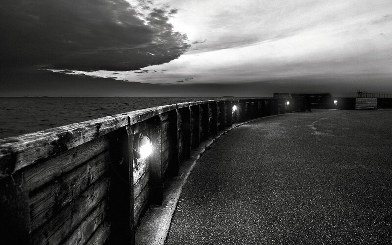 Pier at dusk with lights