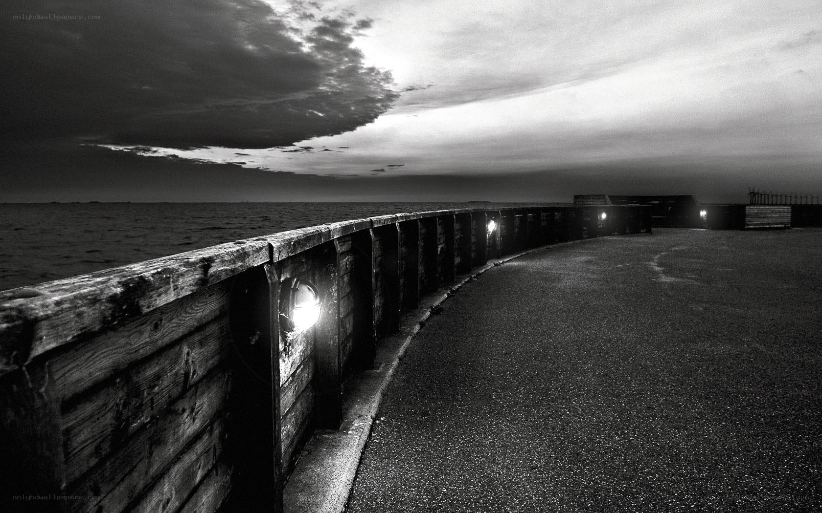 Pier at dusk with lights