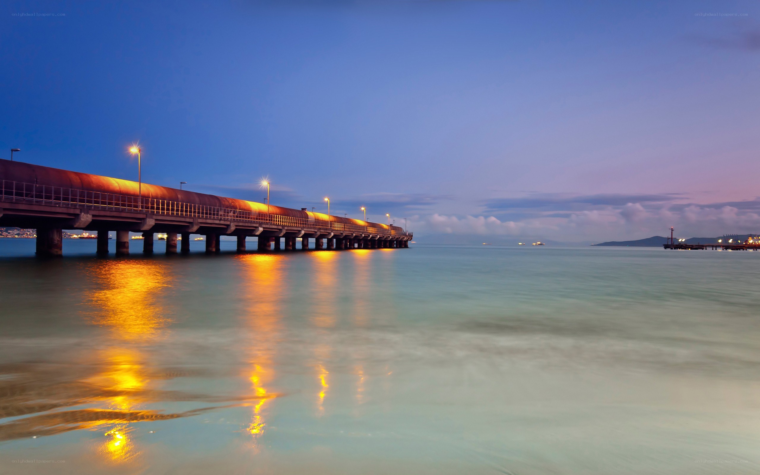Pier at dusk with lights