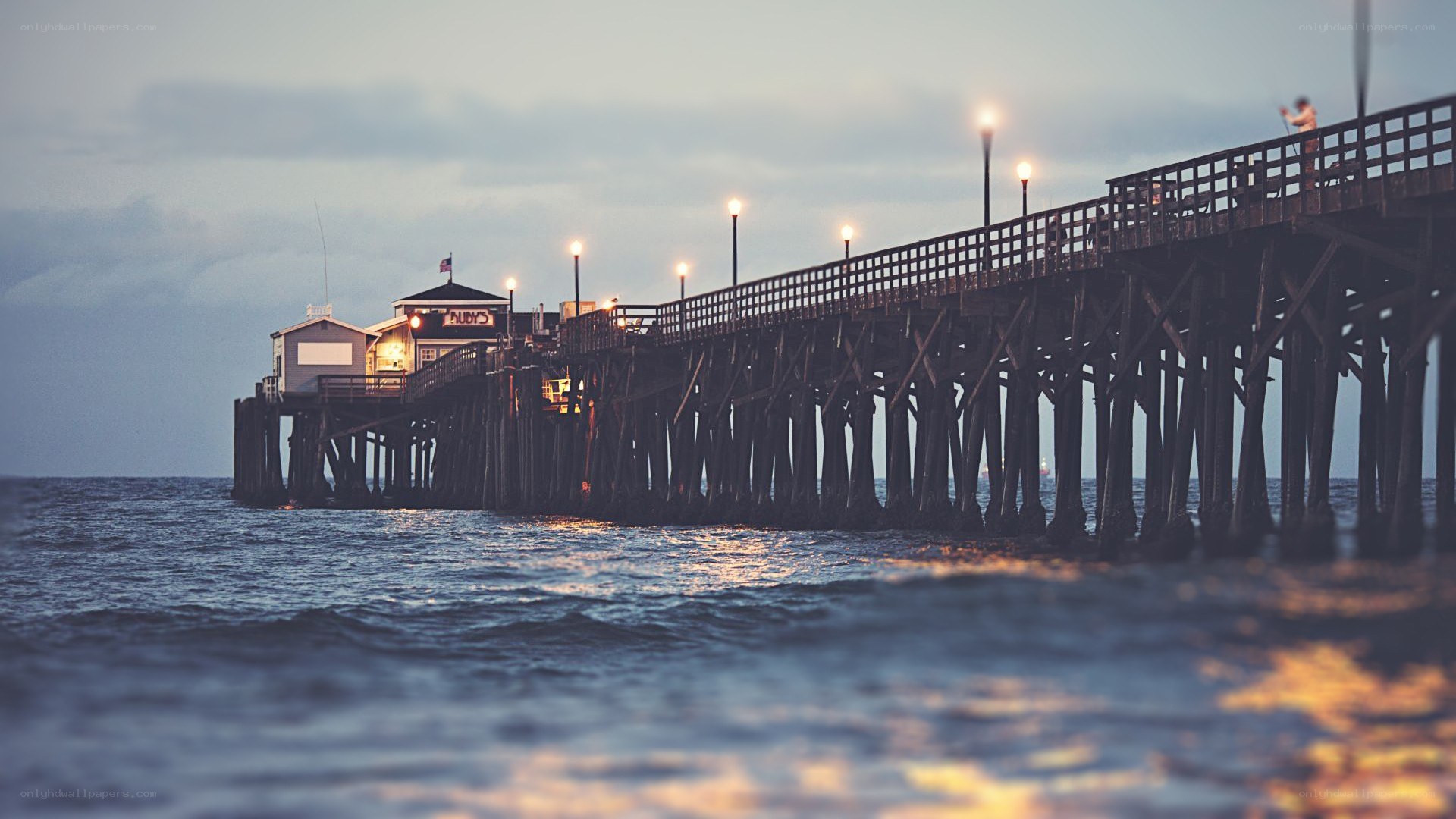 pier at dusk with lights