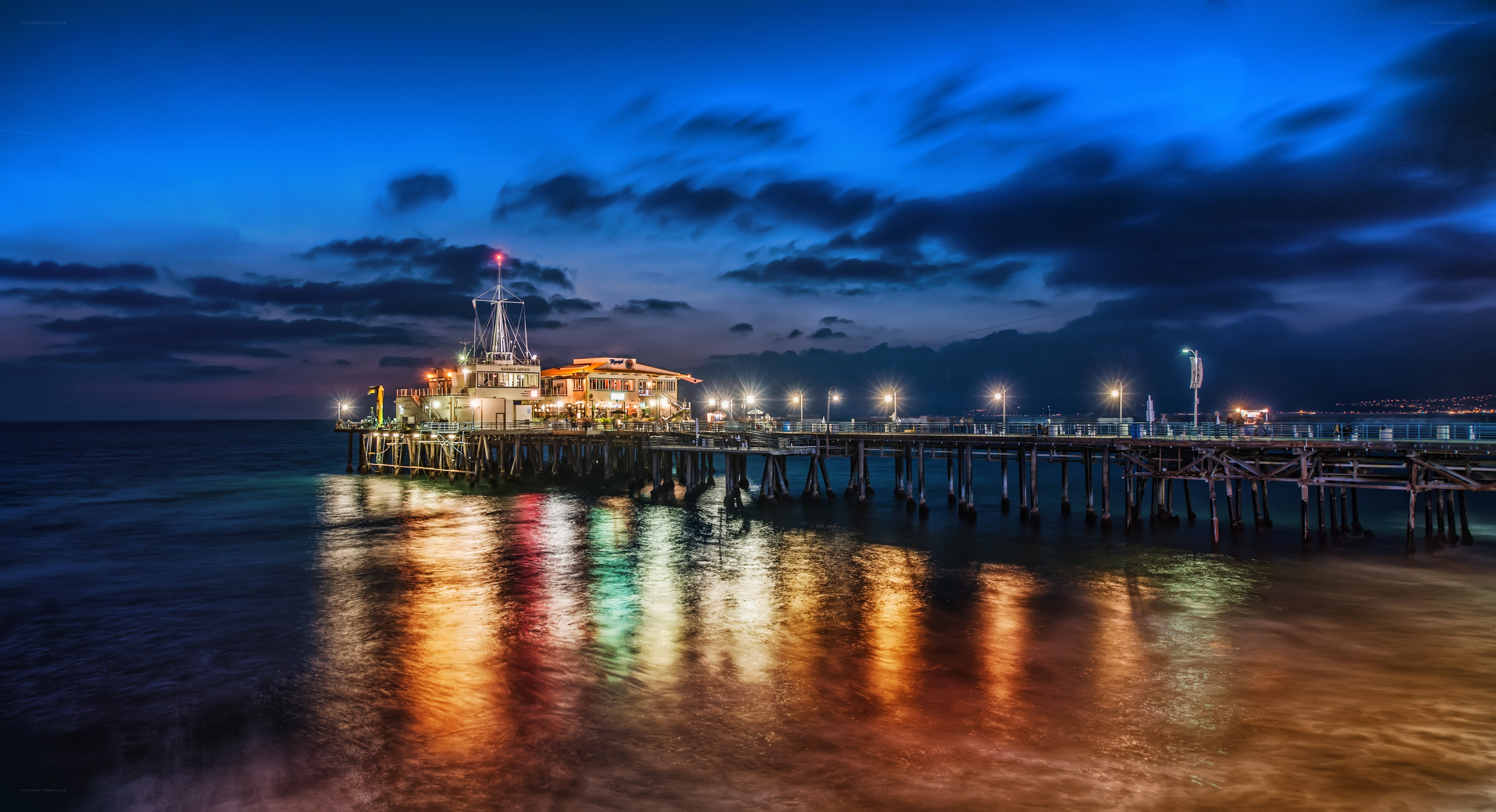 Pier at dusk with lights