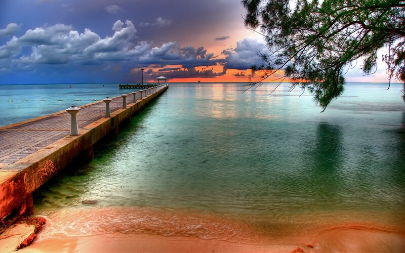 Pier at Sunset — Blue, Dramatic, Photograph, Clouds, Tree, Ocean