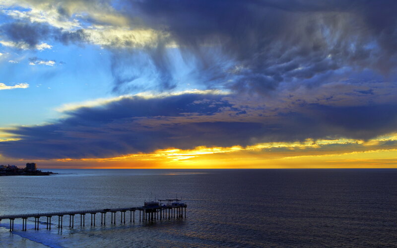 Pier at Sunset — Blue, Dramatic, Photograph, Ocean, Clouds, City