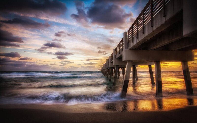 Pier at Sunset — Blue, Dramatic, Photograph, Ocean, Clouds, Sand