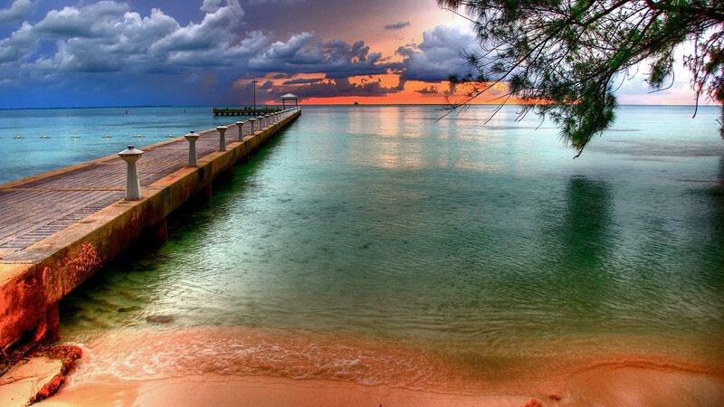 Pier at Sunset — Blue, Dramatic, Photograph, Ocean, Clouds, Tree
