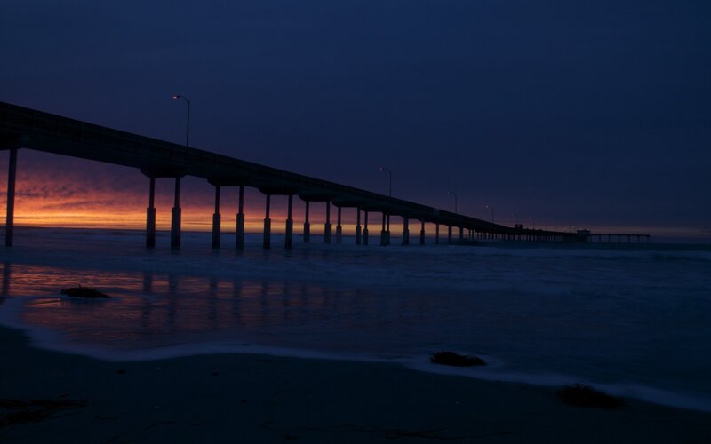 Pier at Sunset — Blue, Dramatic, Photograph, Ocean, Sky, Beach, Orange, Black