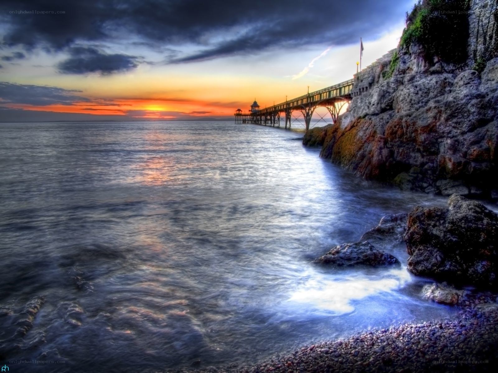 Pier at sunset by the sea