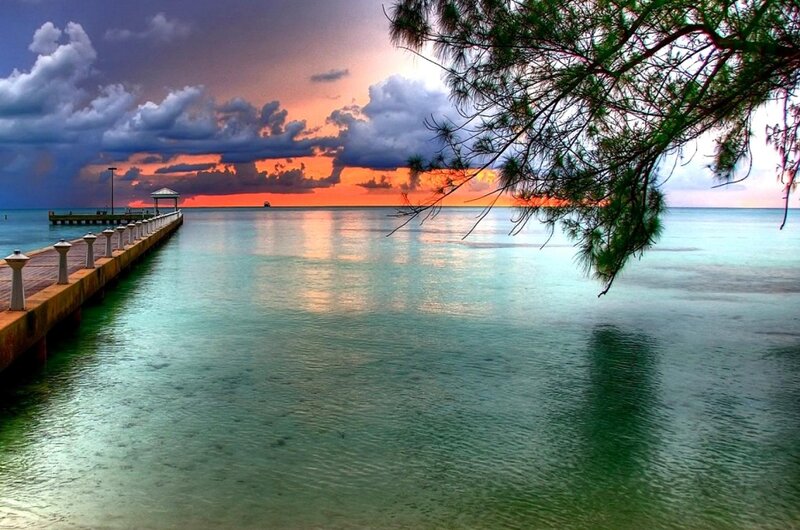 Pier at Sunset — Orange, Dramatic, Photograph, Clouds, Tree Branch