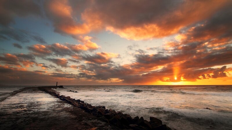 Pier at Sunset — Orange, Dramatic, Photograph, Ocean, Clouds, Lighthouse