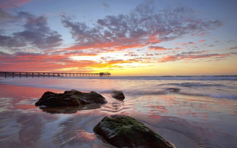 Pier at Sunset — Orange, Serene, Photograph, Ocean, Rocks, Clouds