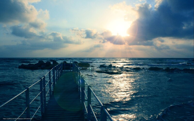 Pier at sunset over the sea