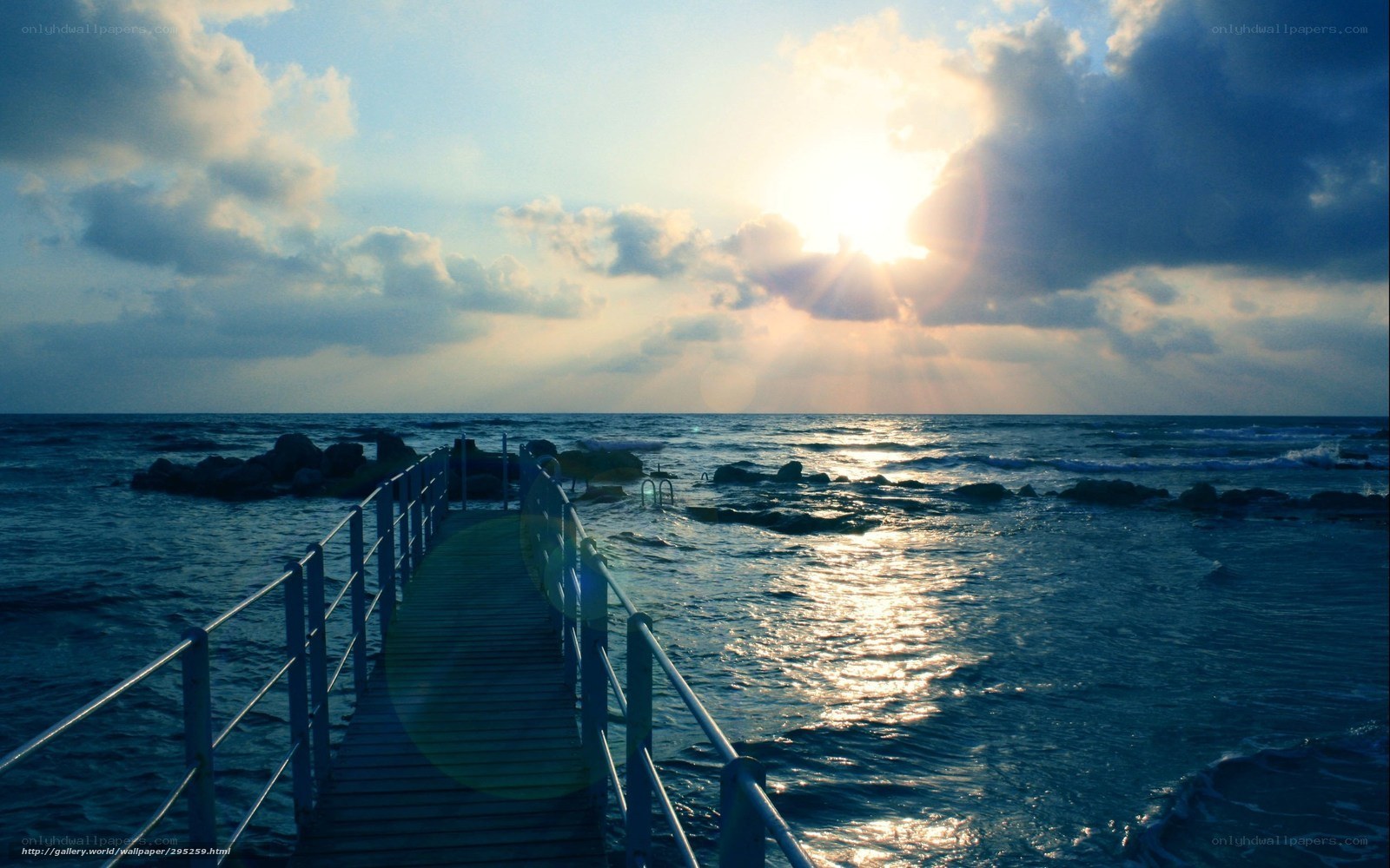 Pier at sunset over the sea