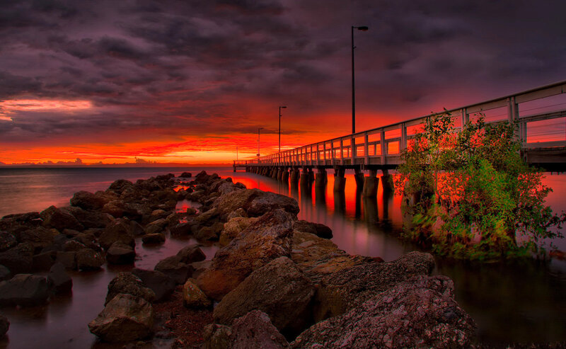 Pier at Sunset — Red, Dramatic, Photograph, Rocks, Sky, Trees