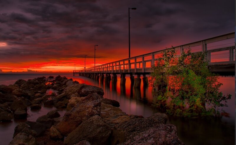 Pier at Sunset — Red, Dramatic, Photograph, Rocks