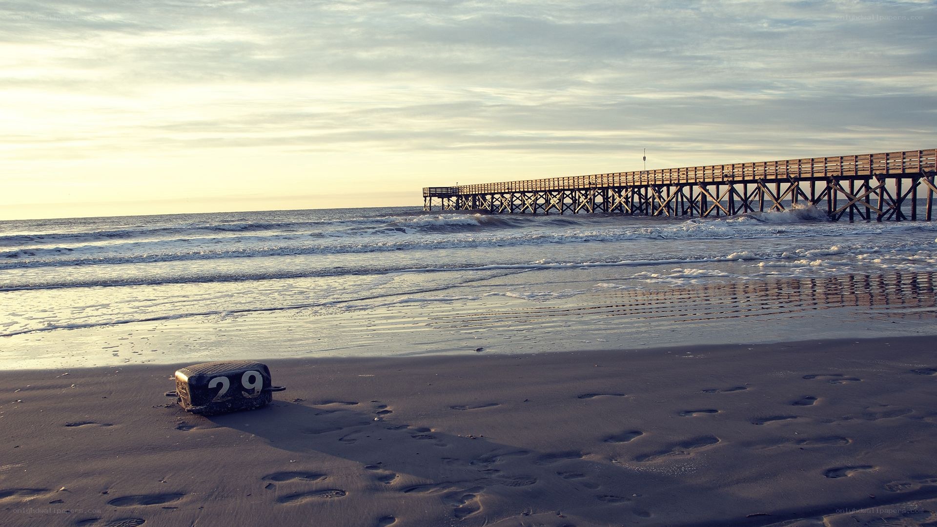 Pier at sunset with buoy