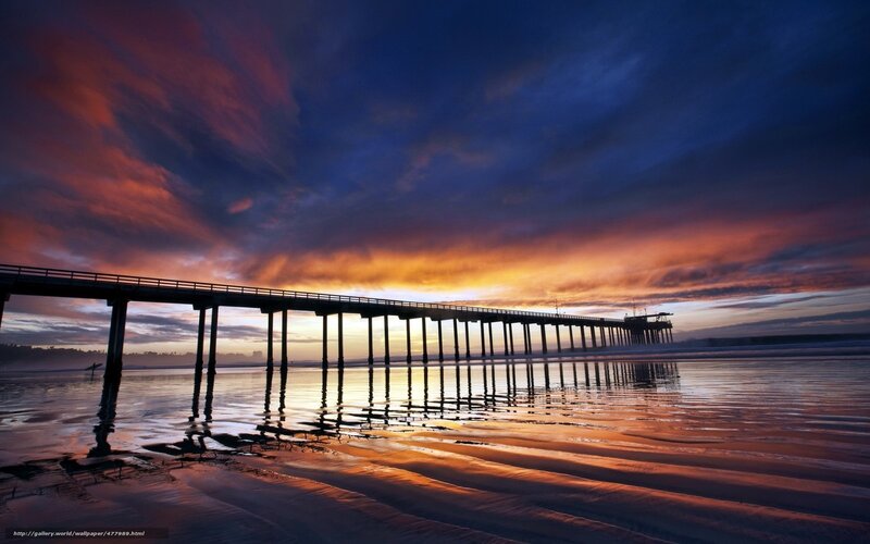 Pier at sunset with colorful sky