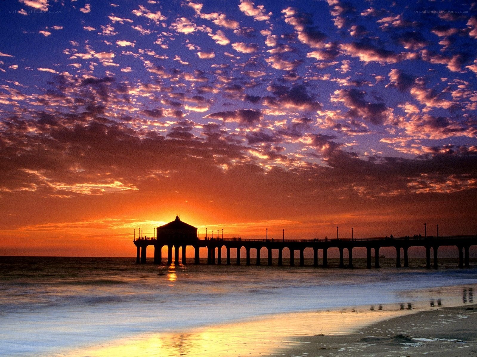 Pier at sunset with colorful sky