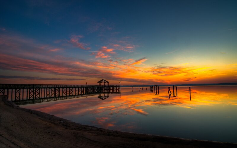 Pier at sunset with colorful sky