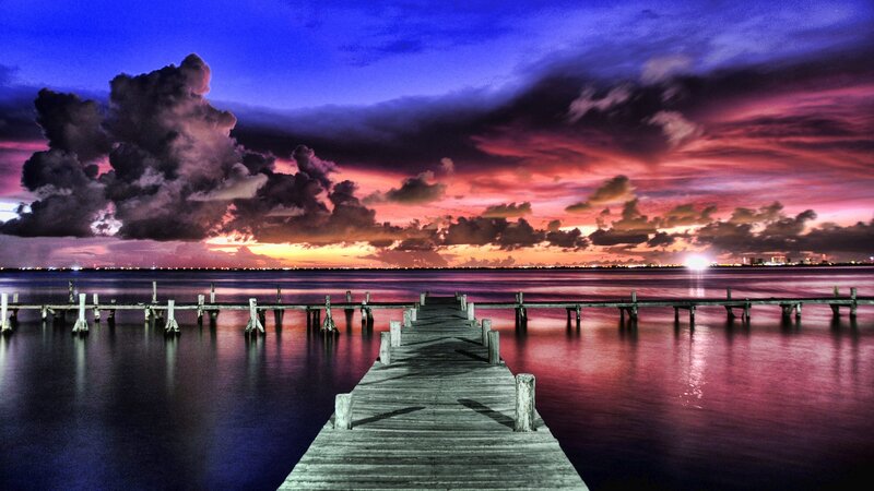 Pier at sunset with colorful sky