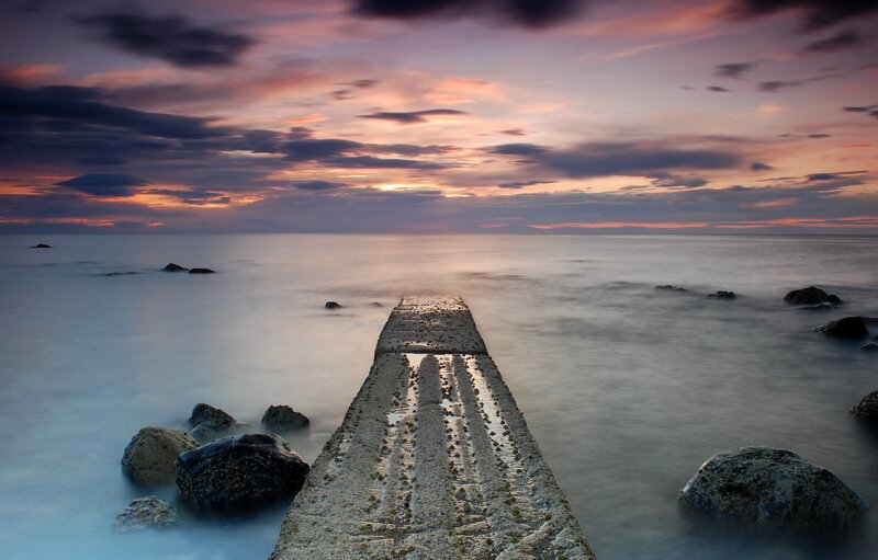Pier at sunset with colorful sky