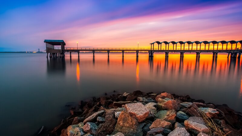 Pier at sunset with colorful sky