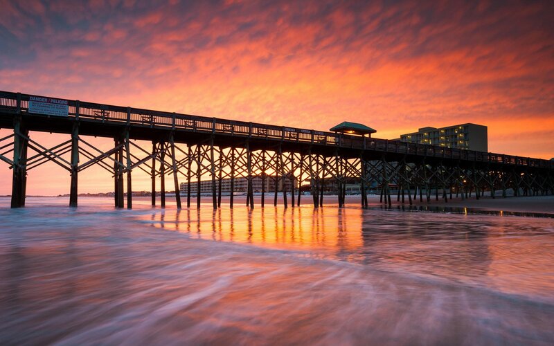Pier at sunset with colorful sky