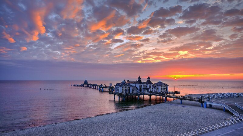 Pier at sunset with colorful sky