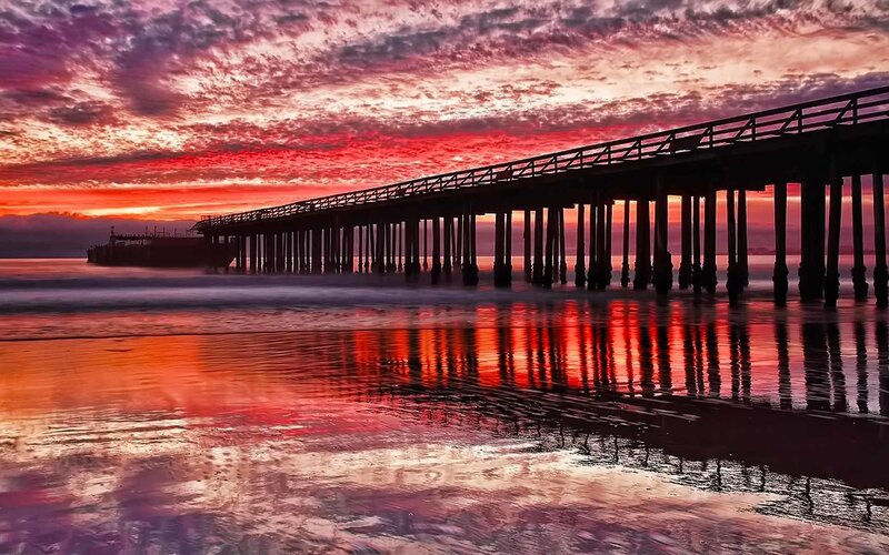 Pier at sunset with colorful sky