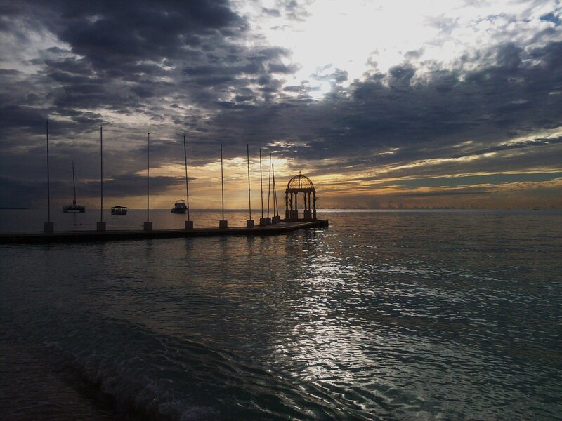 Pier at sunset with gazebo