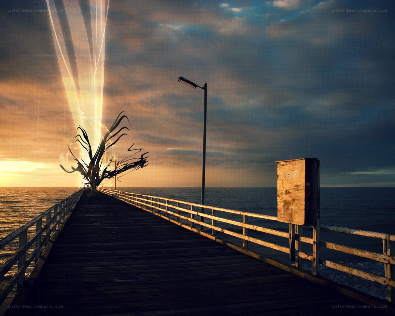 Pier at sunset with light beams
