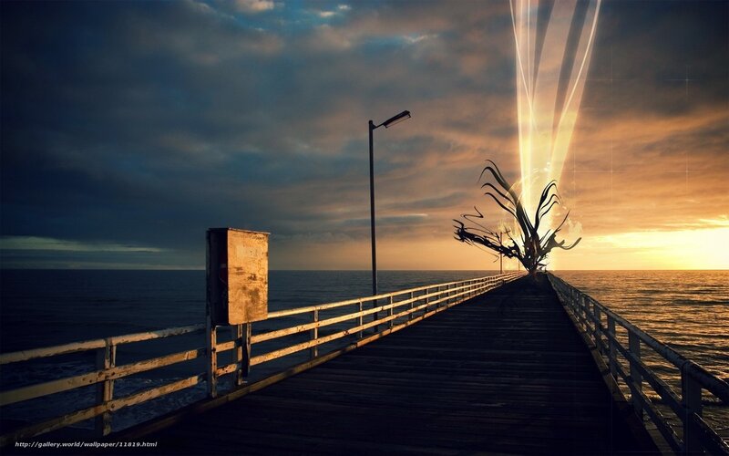 Pier at sunset with light beams
