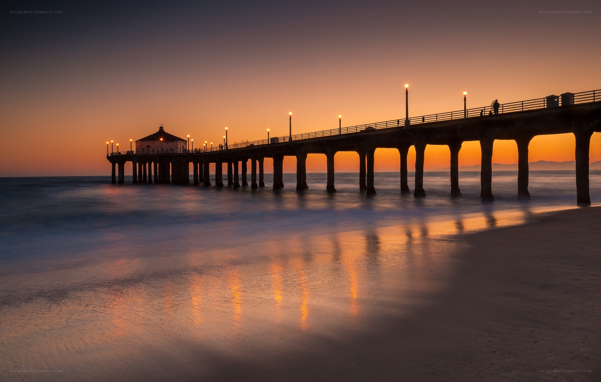 Pier at sunset with lights