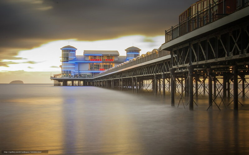 Pier at sunset with lights