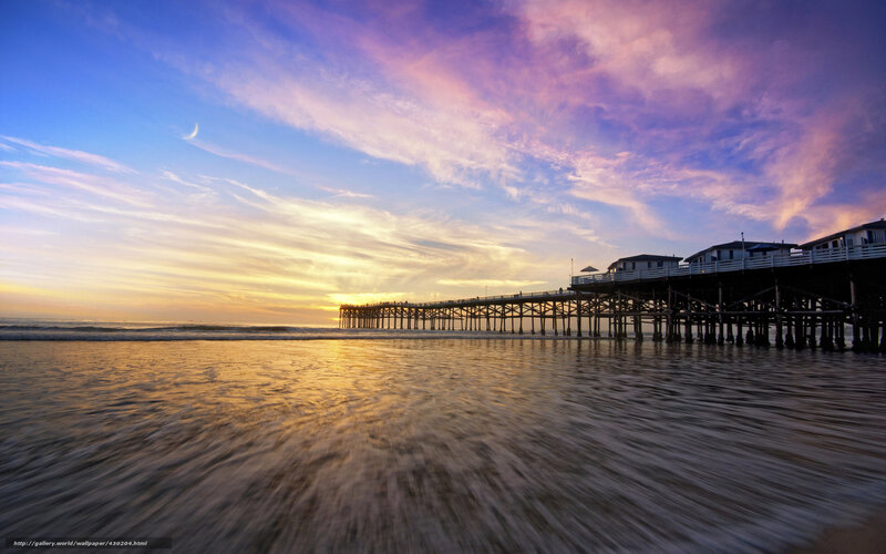 Pier at sunset with moon