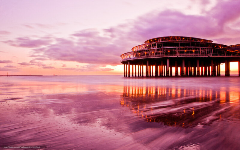 Pier at sunset with purple sky