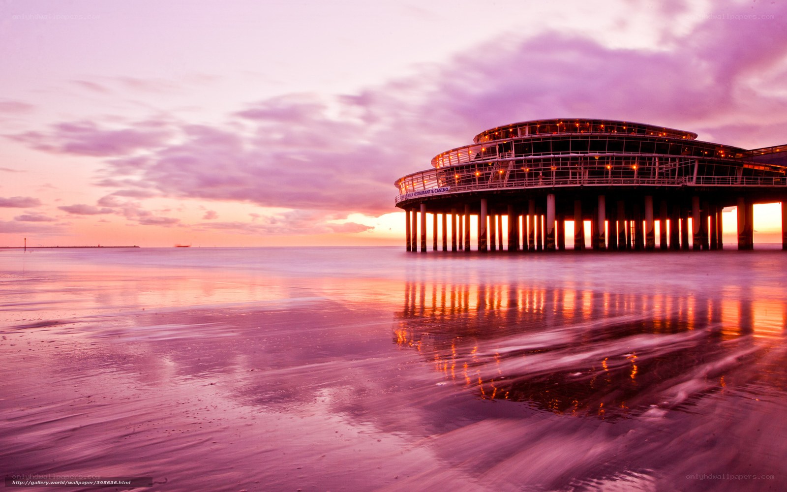 Pier at sunset with purple sky