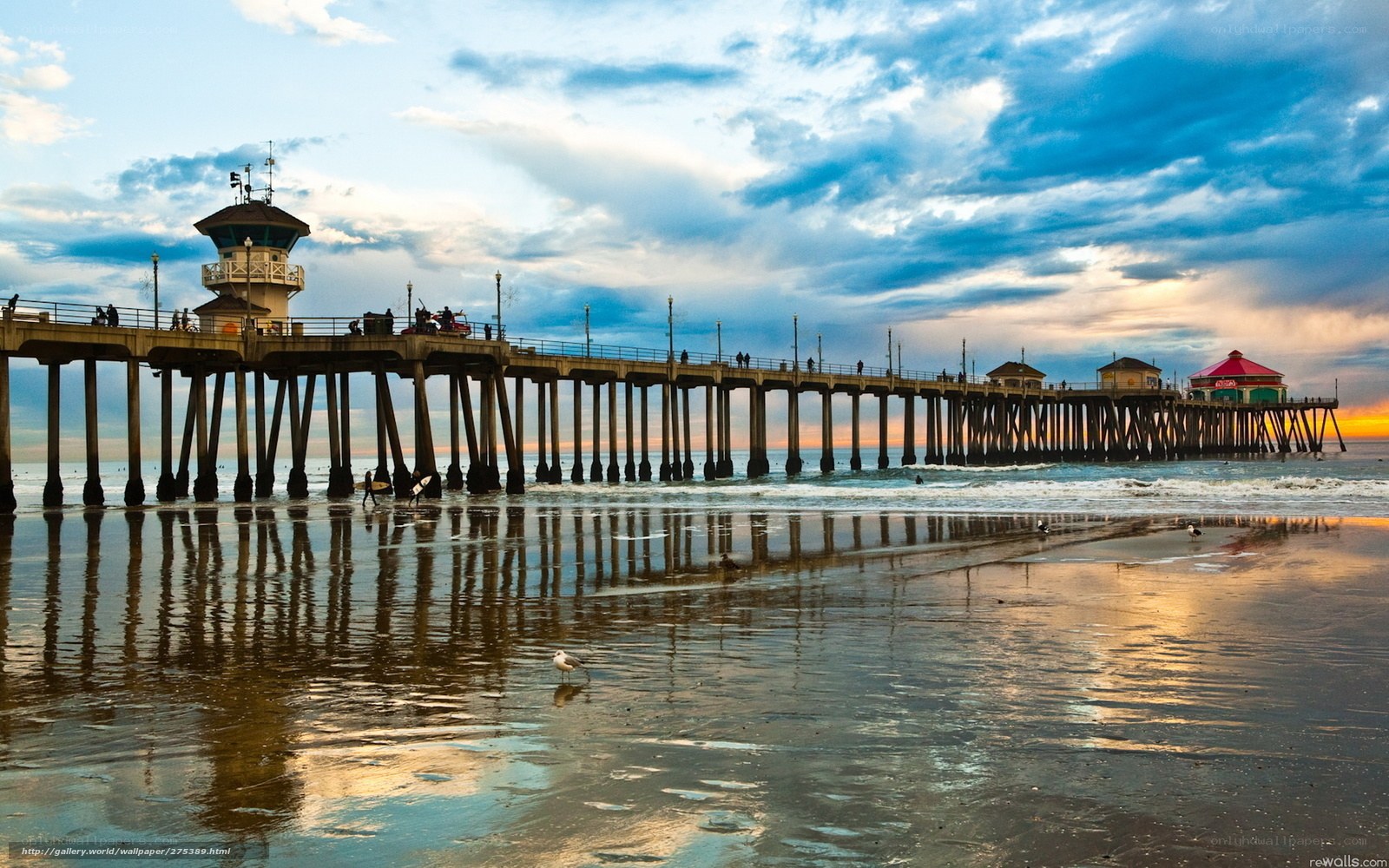 Pier at sunset with reflections