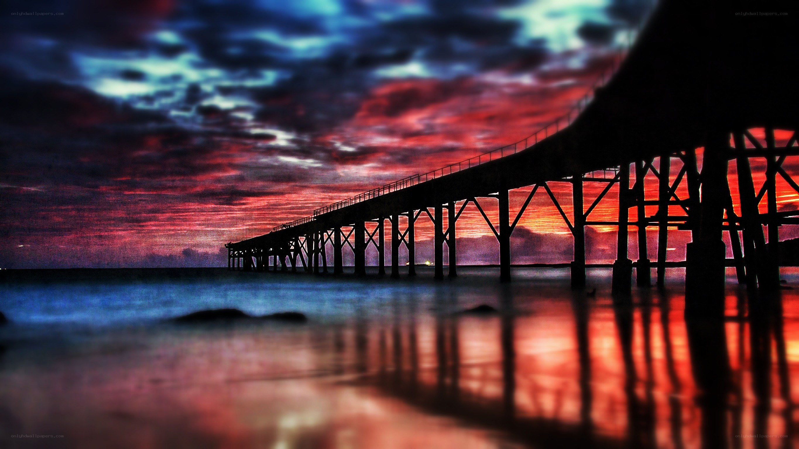 Pier at sunset with vibrant sky