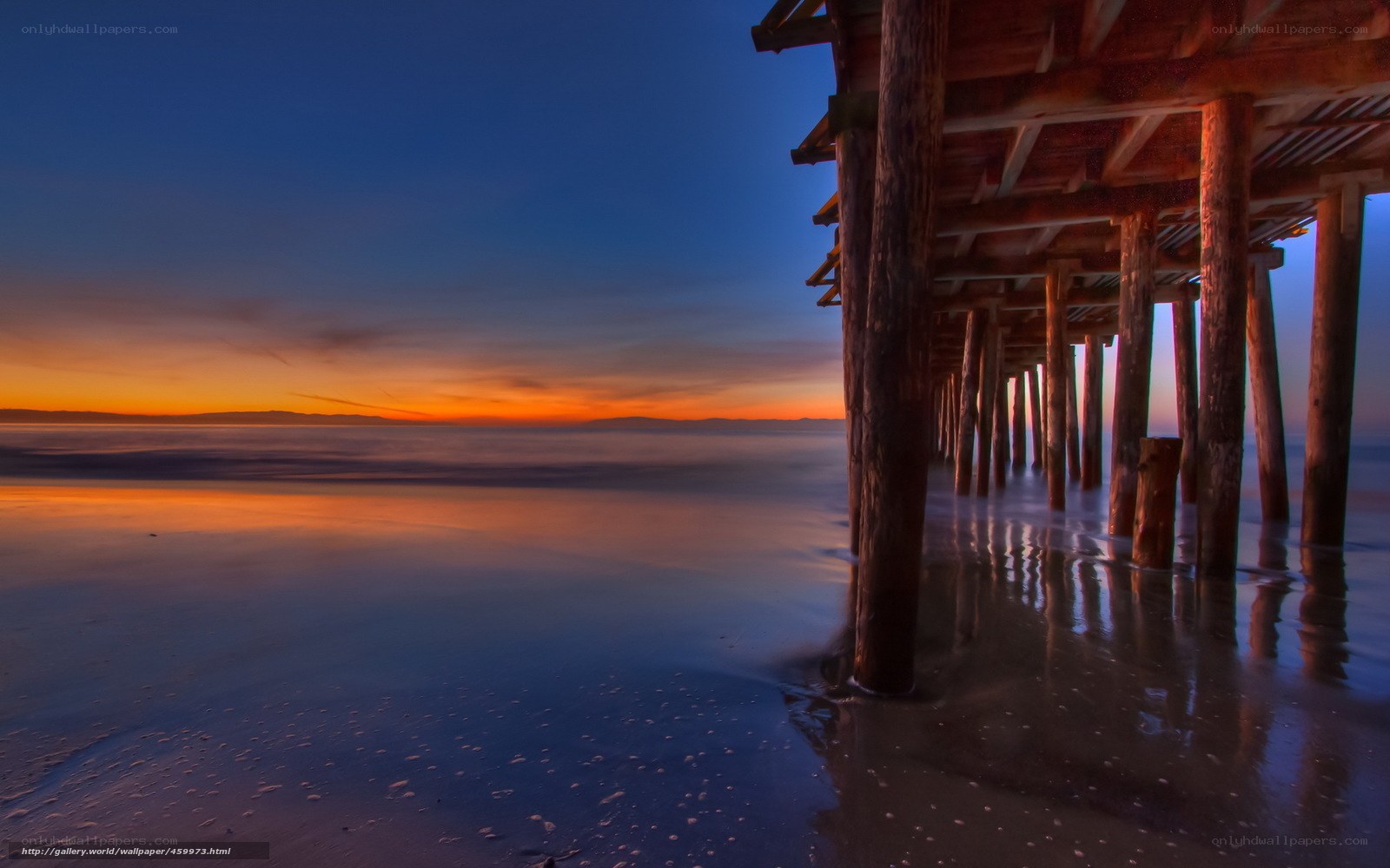 Pier at sunset with vibrant sky