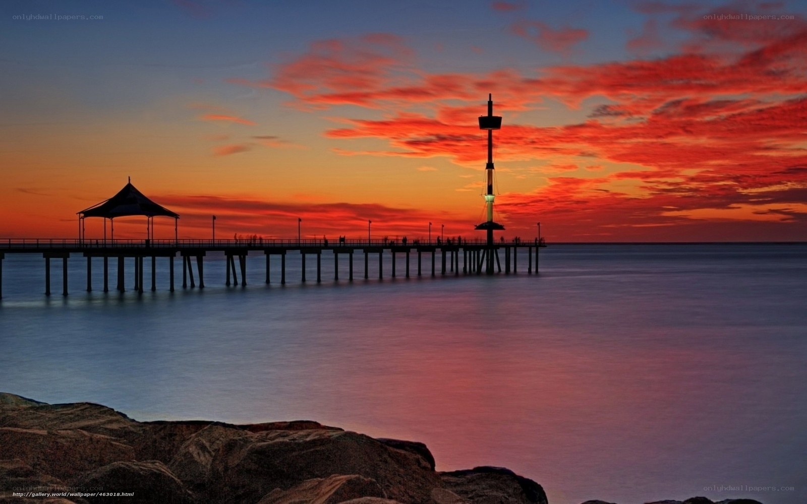 Pier at sunset with vibrant sky