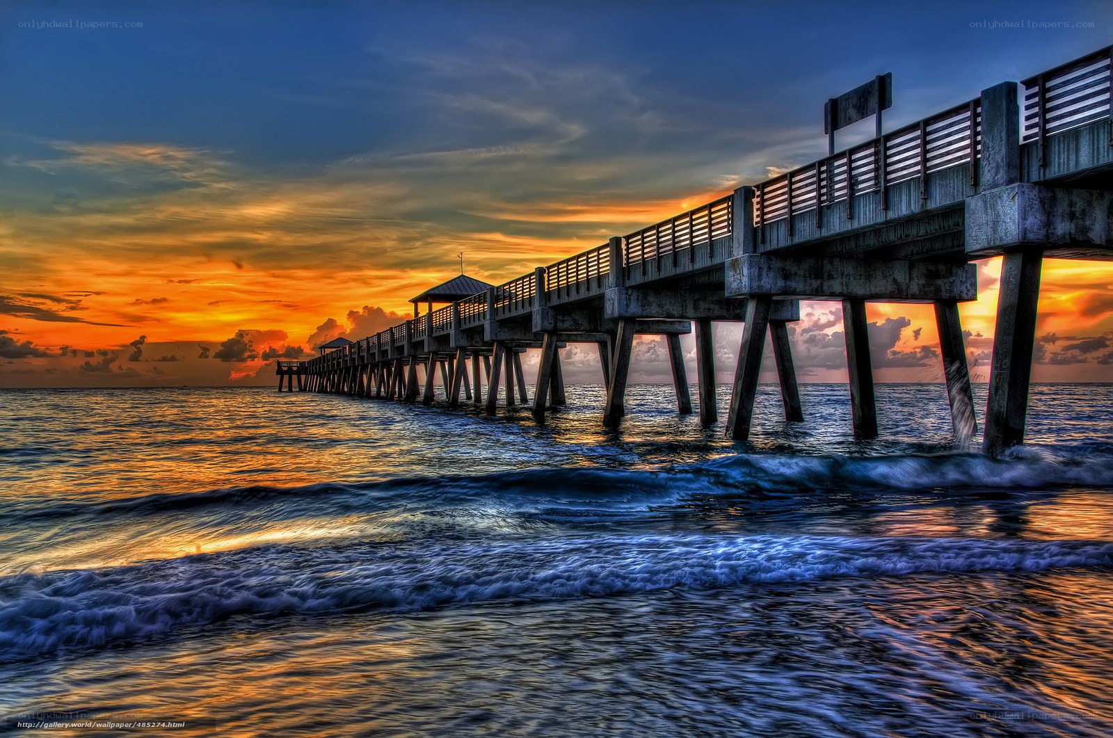 Pier at sunset with vibrant sky