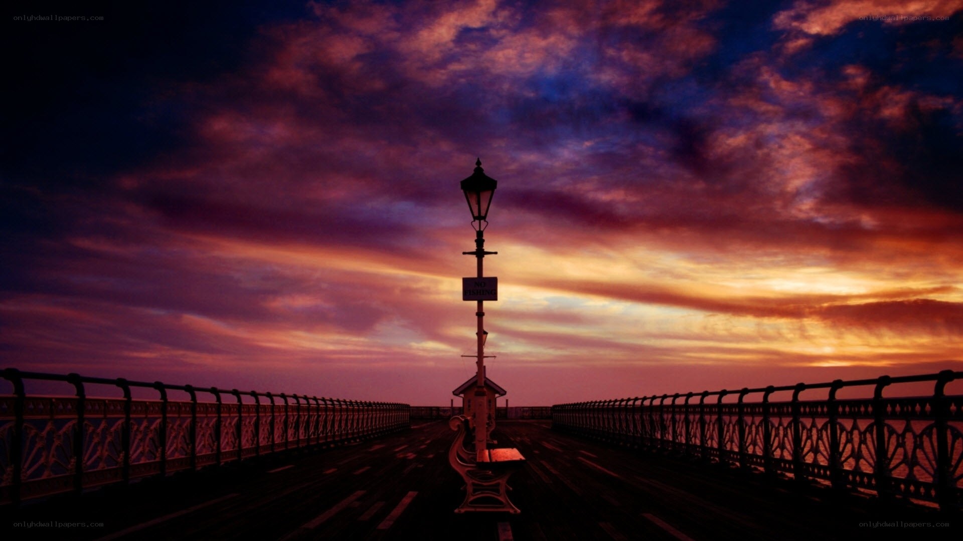 Pier at sunset with vibrant sky