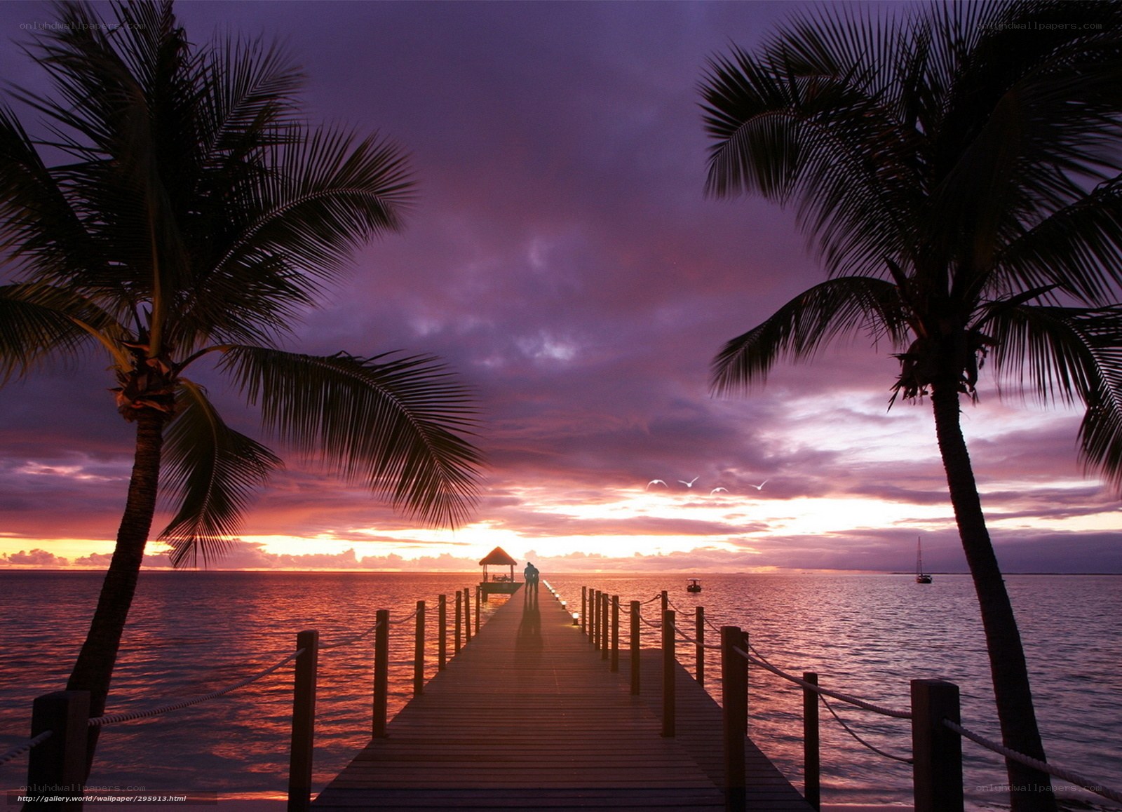 Pier at tropical sunset