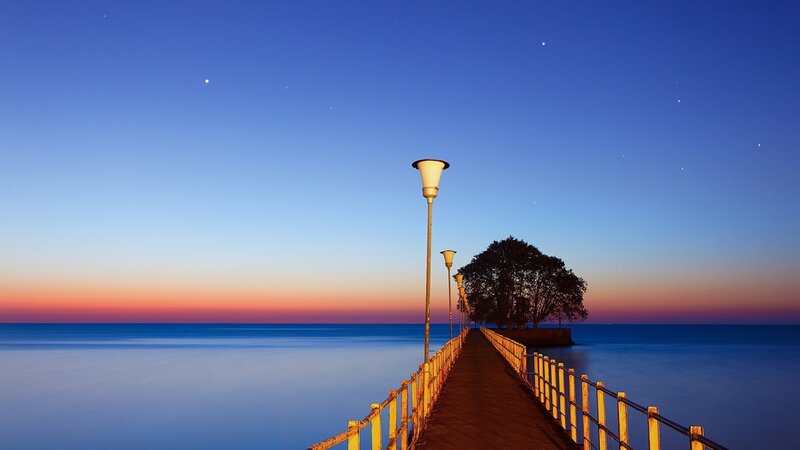 Pier at Twilight — Blue, Serene, Sunset, Photograph, Lamp Post
