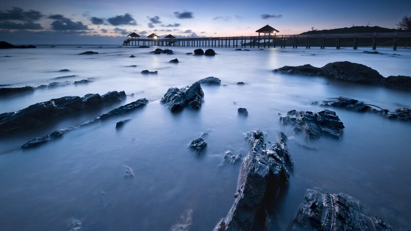 Pier at Twilight — Blue, Serene, Sunset, Photograph, Rocks