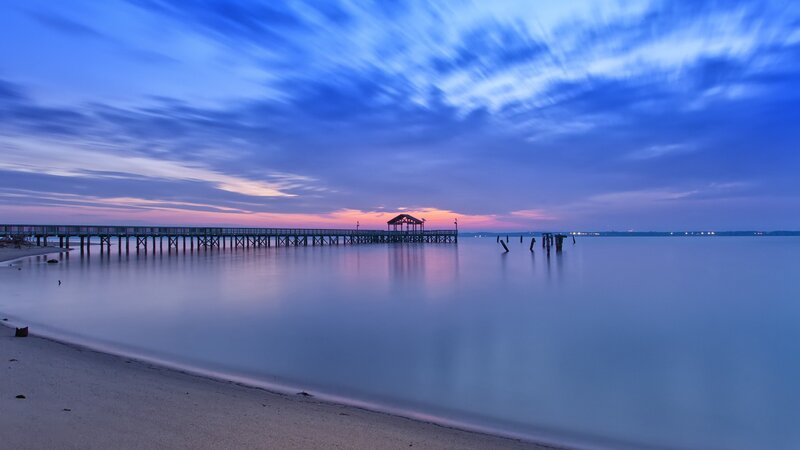 Pier at twilight with colorful sky