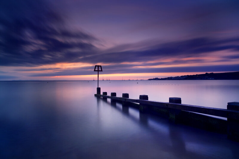 Pier at twilight with colorful sky